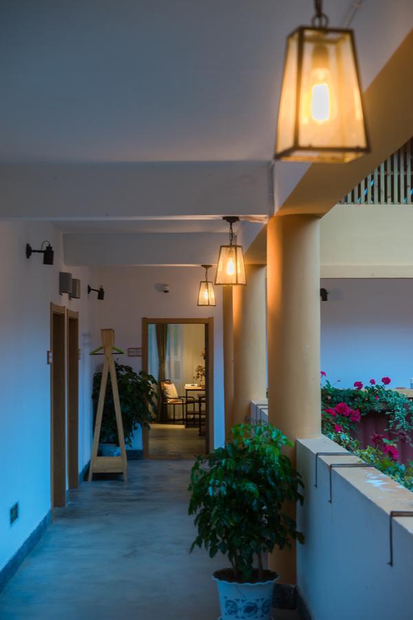 Bamboo Cultural Lake Inn Ninglang Exterior foto